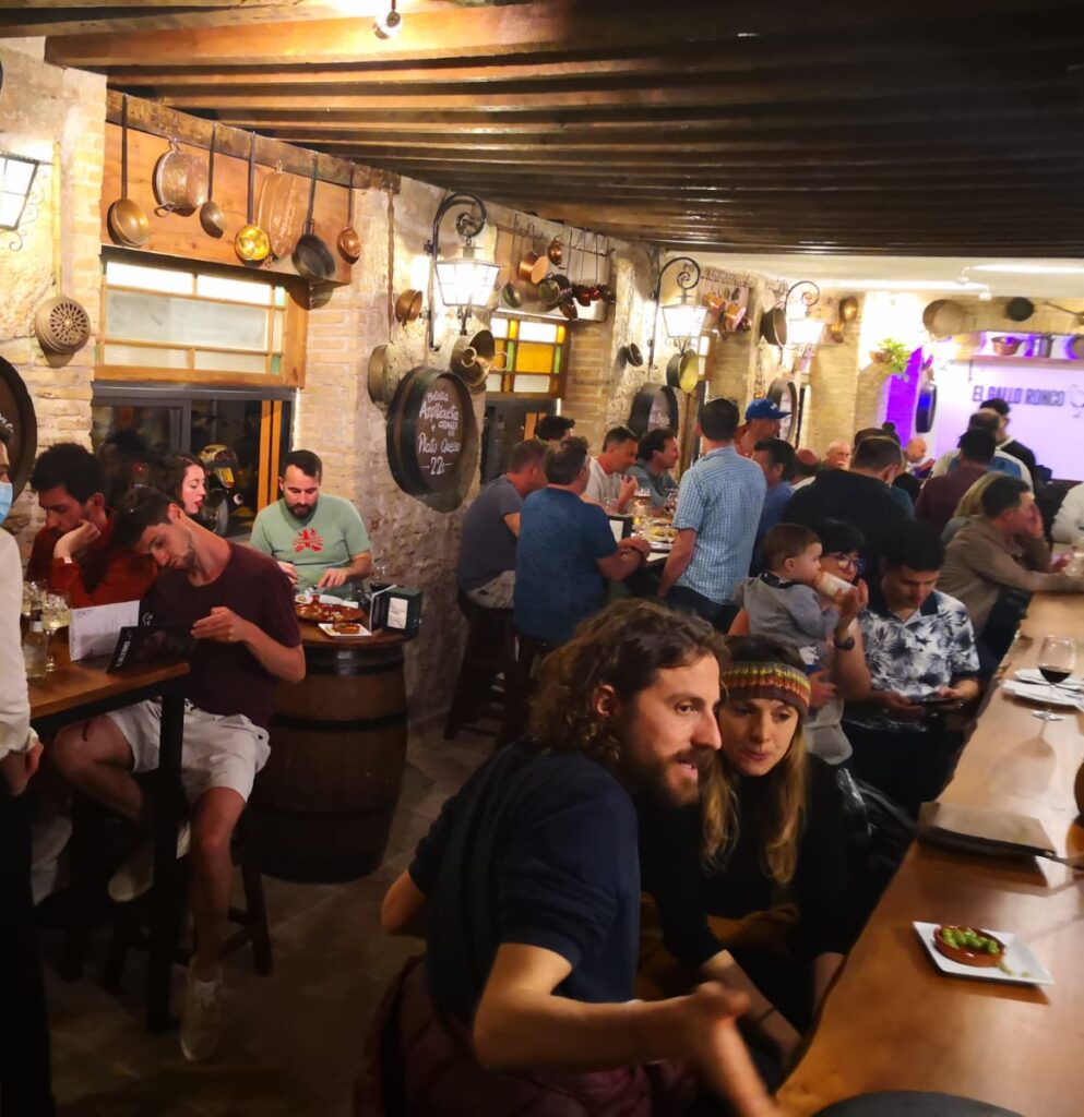 Group of people having lunch at El Gallo Ronco´s restaurant